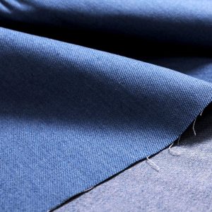 Close-up of blue fabric texture and weave