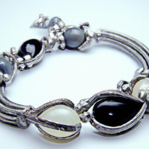 Elegant silver bracelet with black and white stones.