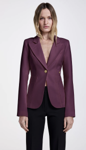 Model wearing purple blazer, black pants