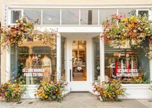 Sézane storefront with floral display in San Francisco.