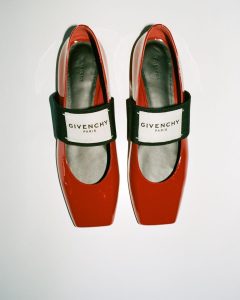 Red Givenchy Mary Jane shoes with logo strap.